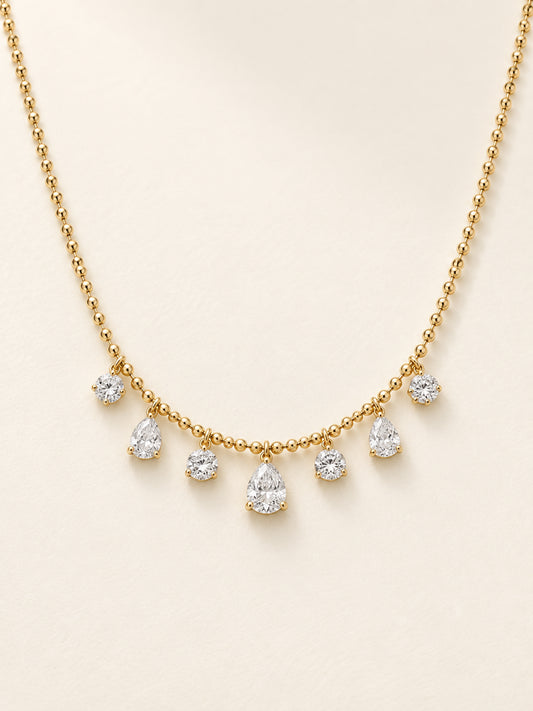 Round and Pear Shaped Diamond Droplet Necklace